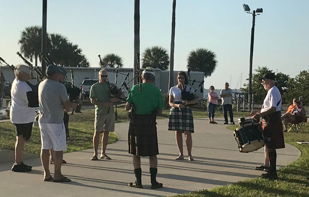 bagpipe band playing in a park in Punta Gorda 