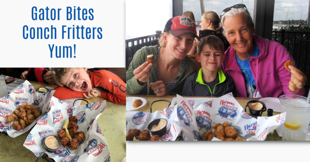 boys trying gator bites and conch fritters