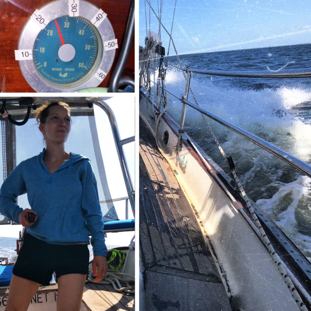 daughter sailing in high winds, waves on side of sailboat, wind meter showing 25 knots