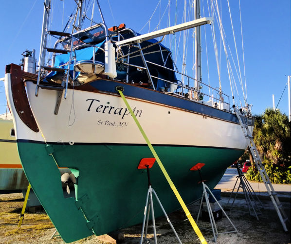 sailboat on hard with ladder for access
