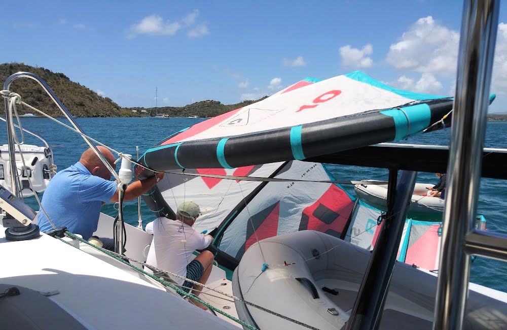 kite boarder's kite landed on solar panels on stern of sailboat 