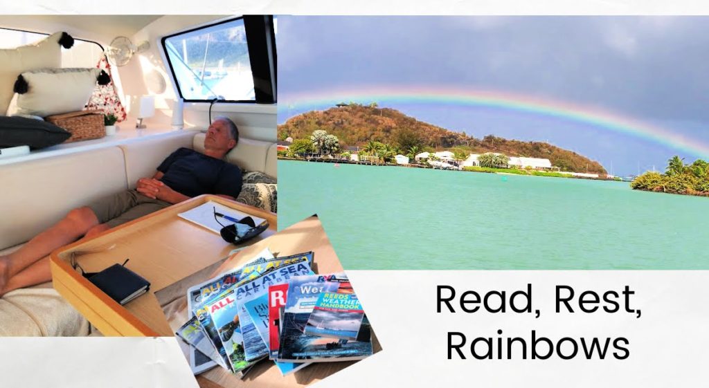 Tony napping on sailboat settee, rainbow over the water, magazines on table 