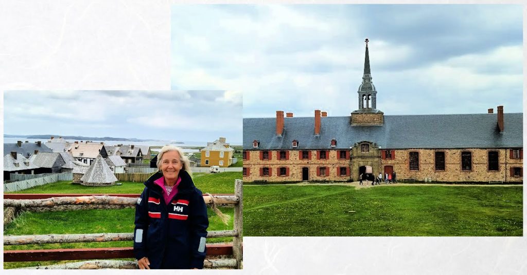 fortress of louisbourg buildings, women near a fence overlooking town 