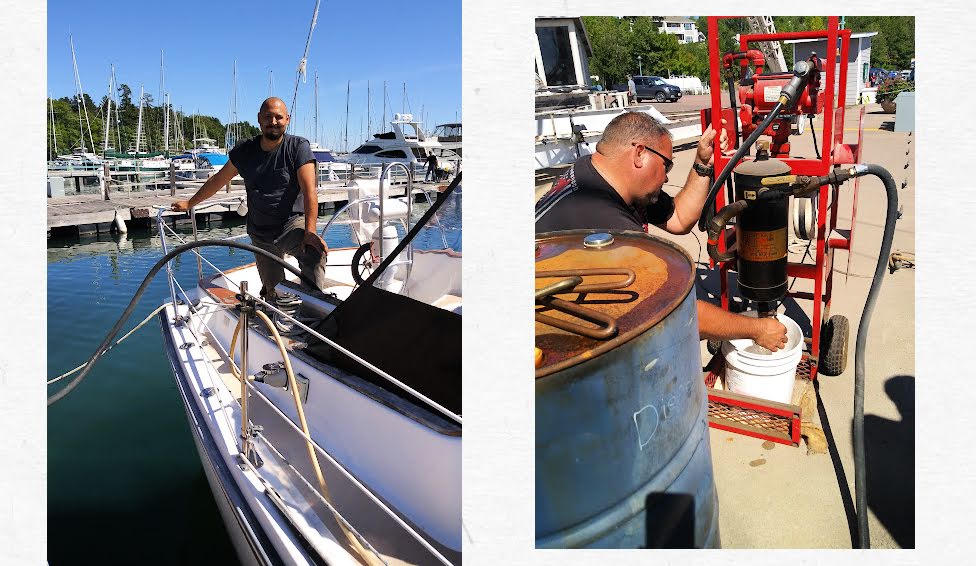 marina mechanics helping clean our fuel tank on our sailboat 