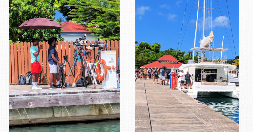 film crew setting up cameras on the dock and on a catamaran at Port Louis marina 