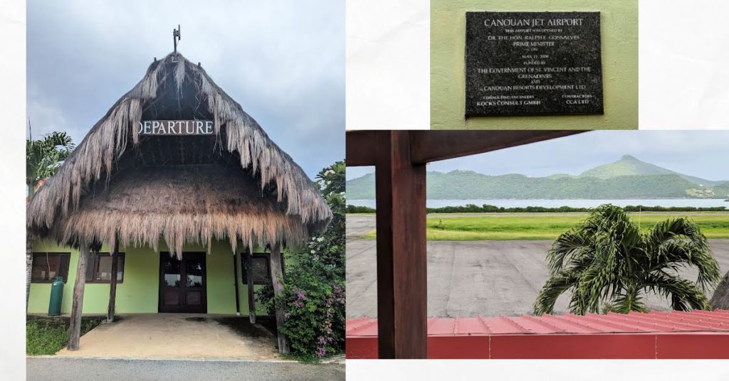 Canoun airport with thatched roof, sign in airport, runway with ocean and hills in background