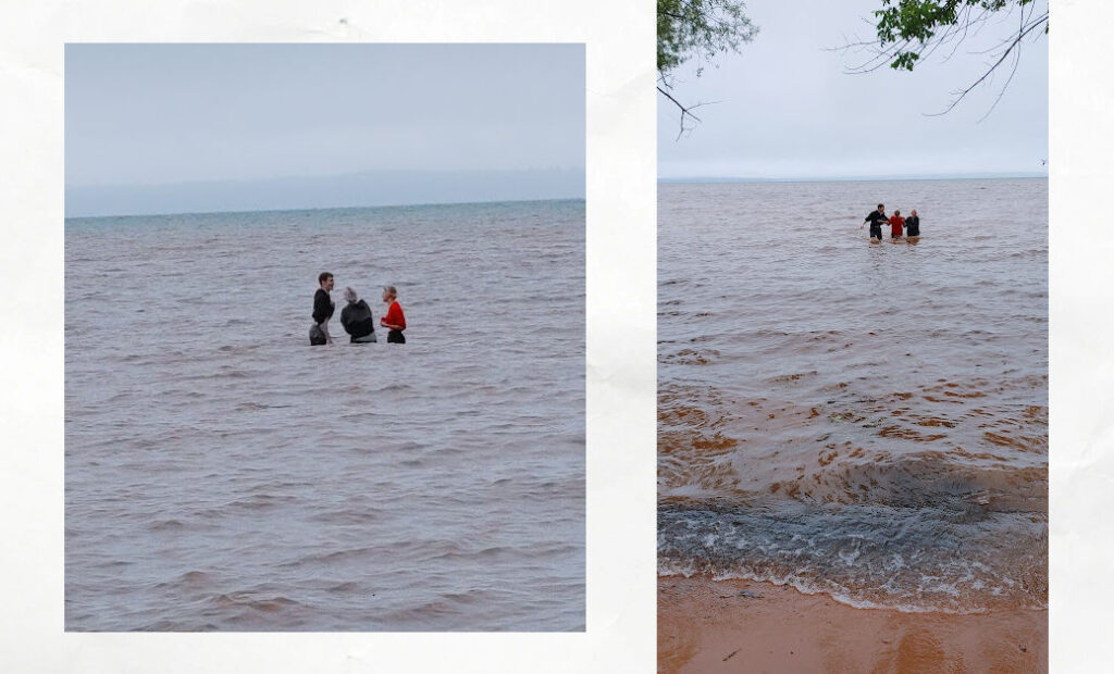 young adults in lake superior up to their waist 