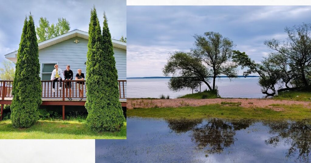 3 young adults outside of a cabin on the deck, picture of lake superior with beach and tree 