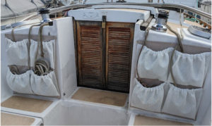 sailboat cockpit sheet pockets on either side of companionway 