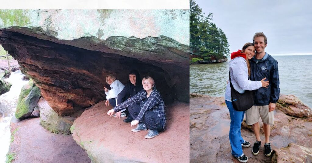 3 young adults under a rock near the waterfall, parents hugging on a rock overlooking lake superior 