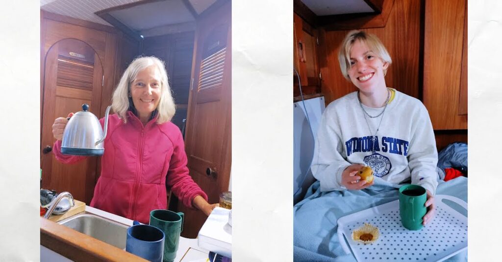 woman with tea kettle on sailboat, young adult enjoying a cup of tea and muffin in sailboat cabin 