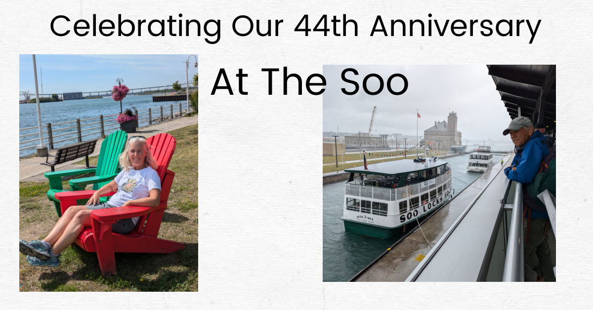 man looking at boat going through locks, woman on red chair by river at the soo