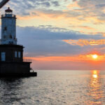 Sunrise over Lake superior by Keweenaw lower entrance light