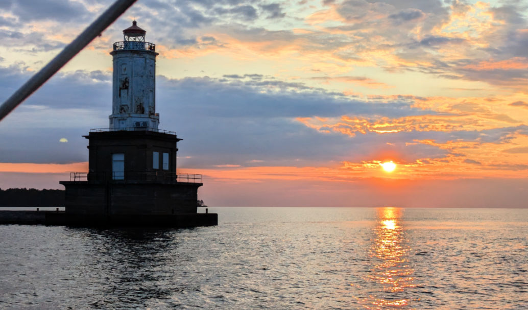 Sunrise over Lake superior by Keweenaw lower entrance light