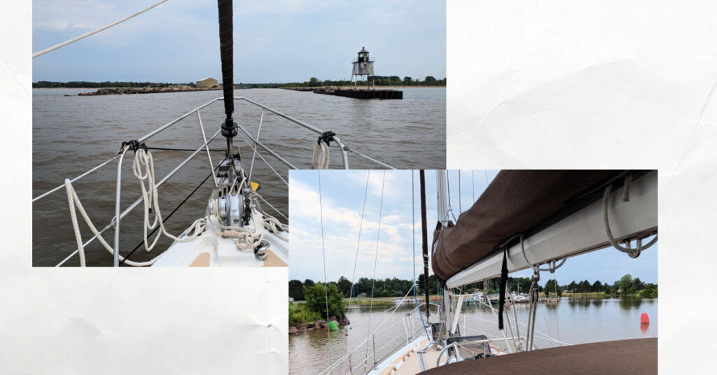 ontonagon outer lighthouse and entrance and inner harbor markers leading to marina from sailboat 