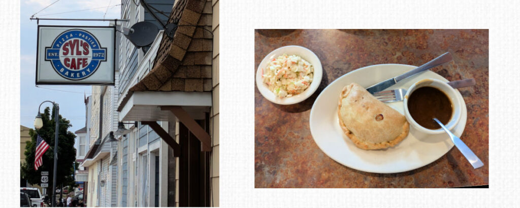 upper peninsula pasty with gravy, restaurant sign for syl's cafe in small town ontonagon's main strait 