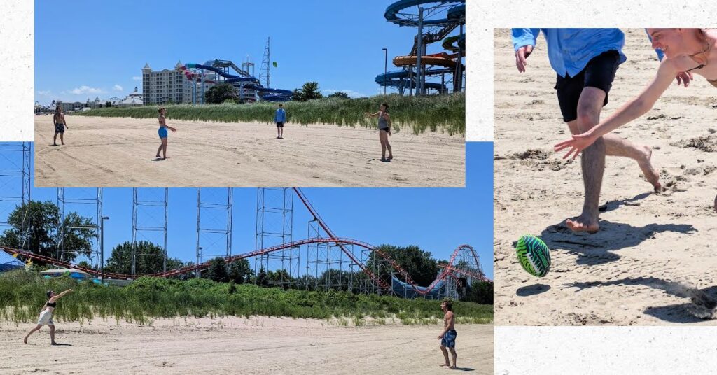 beach football throws and catches cedar point in background