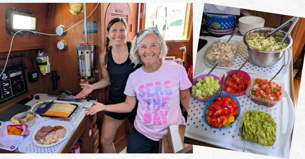 meals aboard sailboat; salad spread with toppings, meat and cheese spread with crackers, two ladies in galley 