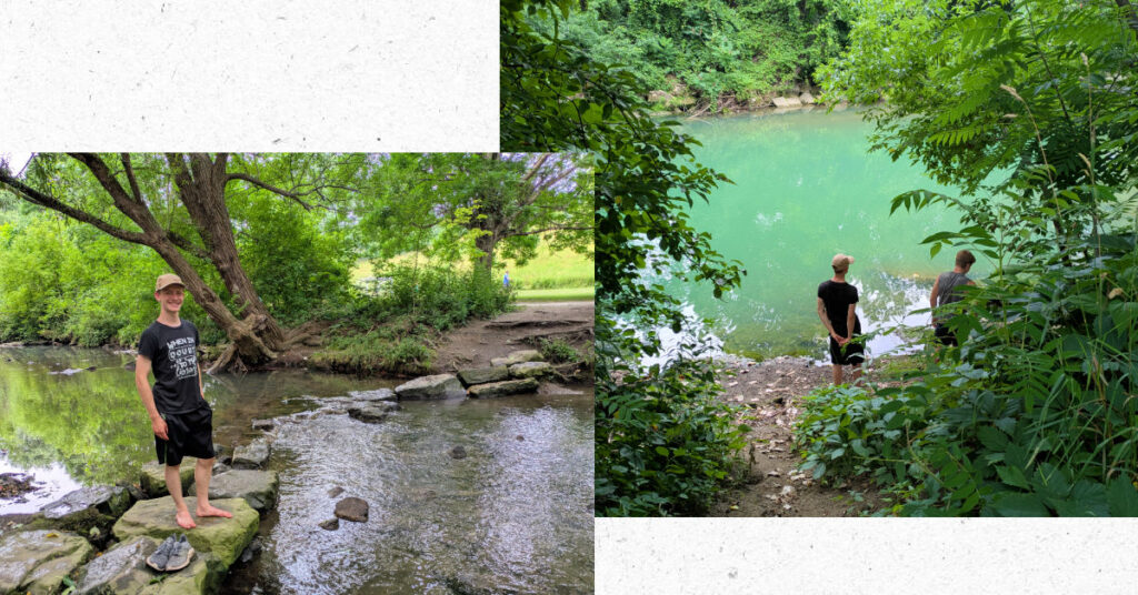 teen boys at a stream with rocks to cross it and lagoon at a park 