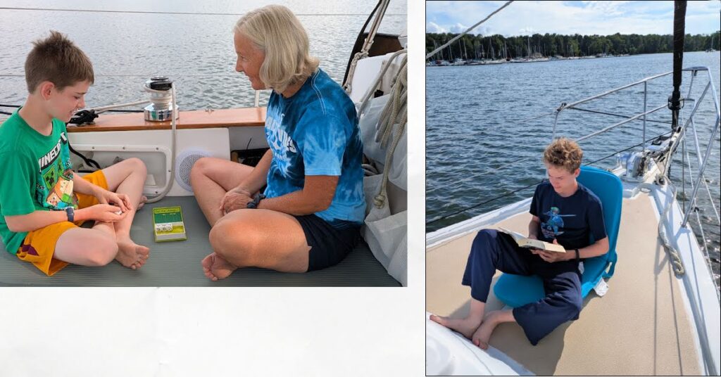 teen reading on bow of sailboat while at anchor, grandson and grandma playing story cubes in cockpit of sailboat 
