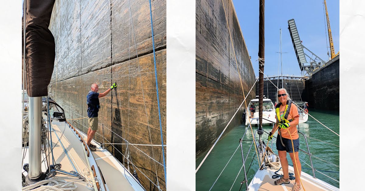 man and woman on deck of sailboat working lines in a lock