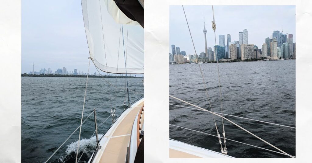 sailing with Toronto in the distance and the city skyline up as viewed from water
