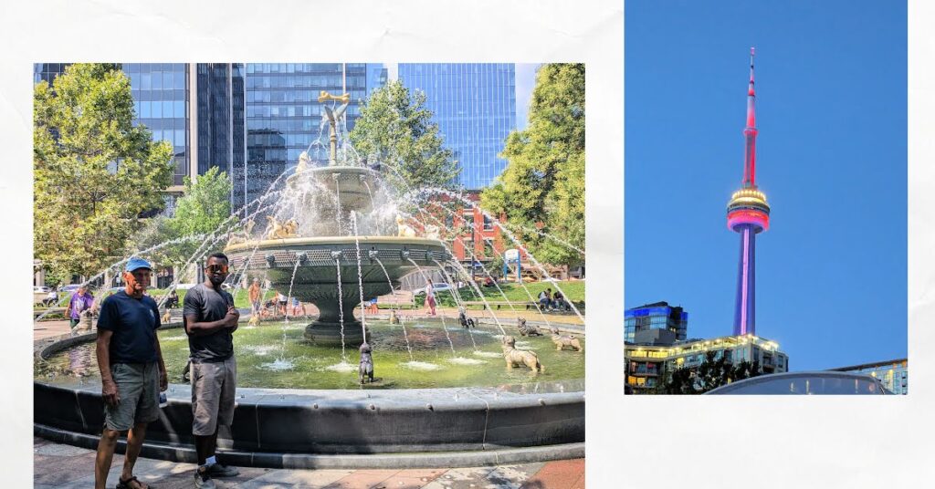 fountain and tower lit up at night in toronto 