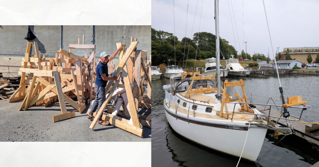 man gathering lumber from leftover mast cradles, mast cradle on deck of sailboat at dock 
